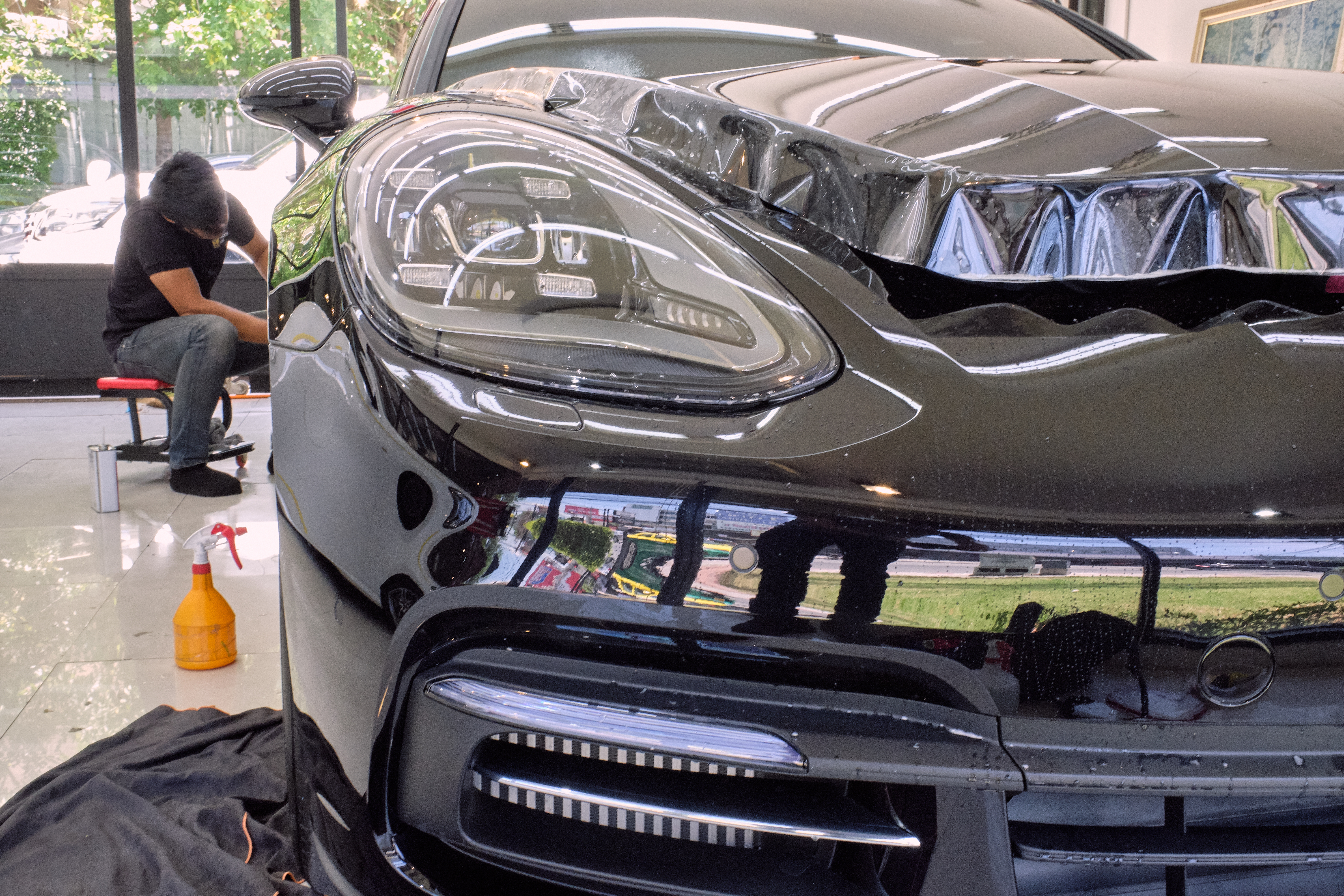 Paint protection film installation on luxury vehicle in Tampa